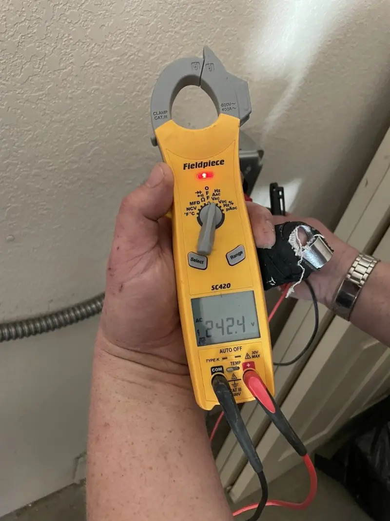 Voltage testing with clamp meter during Outlet Installation in Ridgewood